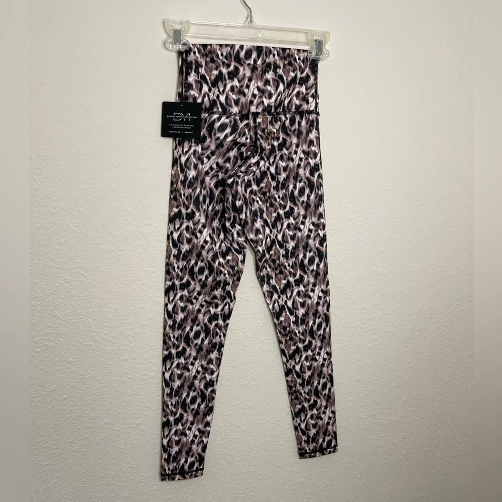 DYI Womens workout leggings. Earthy Animal Print. Black Tan. Size XS. NWT